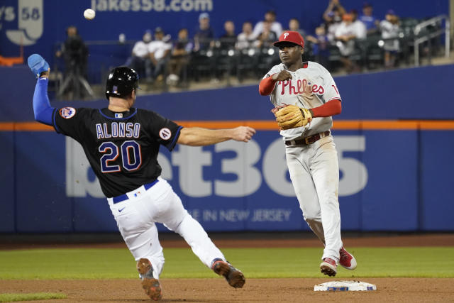 Wheeler, Phillies hold off Mets 4-3 to boost playoff hopes