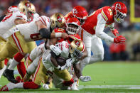 MIAMI, FLORIDA - FEBRUARY 02: Tevin Coleman #26 of the San Francisco 49ers is tackled by Derrick Nnadi #91 of the Kansas City Chiefs in the first quarter in Super Bowl LIV at Hard Rock Stadium on February 02, 2020 in Miami, Florida. (Photo by Kevin C. Cox/Getty Images)