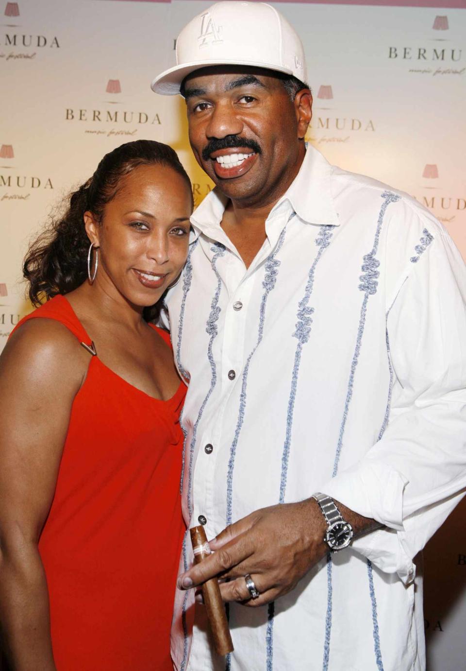Marjorie Bridges (L) and comedian Steve Harvey (R) attend the first night of the Bermuda Music Festival at Southampton Beach Club on October 3, 2007 in Southampton, Bermuda