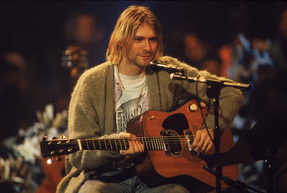 American singer and guitarist Kurt Cobain (1967 - 1994), performs with his group Nirvana at a taping of the television program 'MTV Unplugged,' New York, New York, Novemeber 18, 1993.