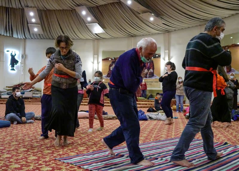 Members of local Alevi community attend a cem in Istanbul