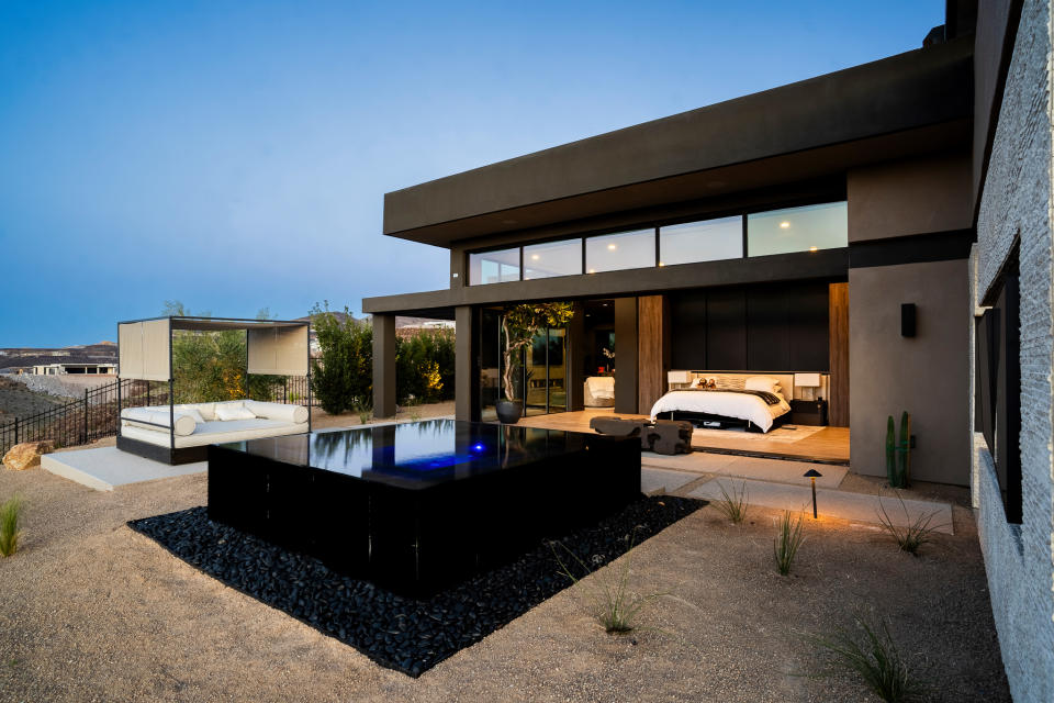 Spa and daybed outside the primary bedroom at Oscar De La Hoya and Holly Sonders residence in Las Vegas.