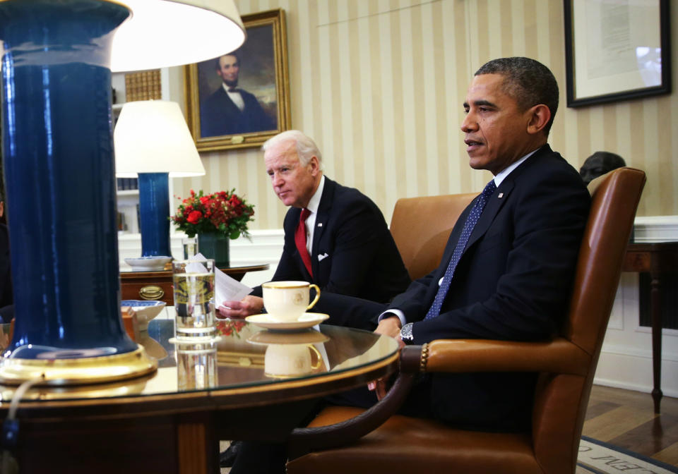 WASHINGTON, DC - DECEMBER 16:  U.S. President Barack Obama (R) and U.S. Vice President Joseph Biden sit during a meeting with Secretary of Treasury Jacob Lew, Secretary of Labor Thomas Perez, National Security Adviser Susan Rice, Director of the National Economic Council Gene Sperling, Secretary of Commerce Penny Pritzker, and Trade Representative Michael Froman in the Oval Office of the White House December 16, 2013 in Washington, DC.  According to the White House, Obama was meeting about trade and the Trans-Pacific Partnership (TPP).   (Photo by Alex Wong/Getty Images)