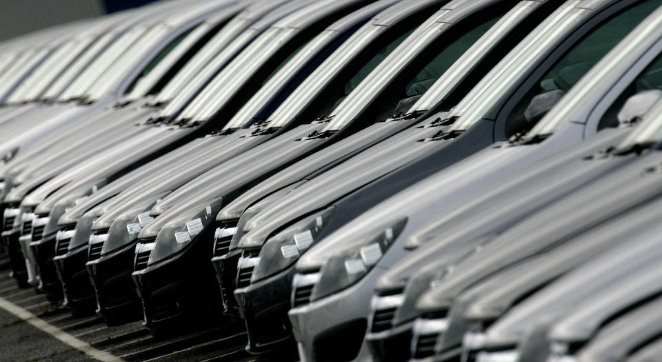 A row Vauxhall Astra cars stand outside the Vauxhall plant at Ellesmere Port near Liverpool, northern England on May 16, 2006. Vauxhall's parent company, General Motors, is expected to announce cutbacks to the workforce at the Ellesmere Port plant.  REUTERS/Phil Noble