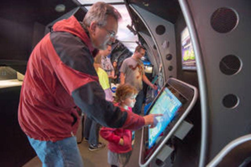 Visitors to NASA's "Journey to Tomorrow" exhibit at the Ohio State Fair will experience an engaging learning environment with interactive workstations onboard.