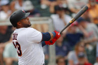 Minnesota Twins designated hitter Nelson Cruz drives in a run with a double in the fifth inning of a spring training baseball game against the Boston Red Sox, Monday, March 18, 2019, in Fort Myers, Fla. Minnesota won 4-1. (AP Photo/John Bazemore)