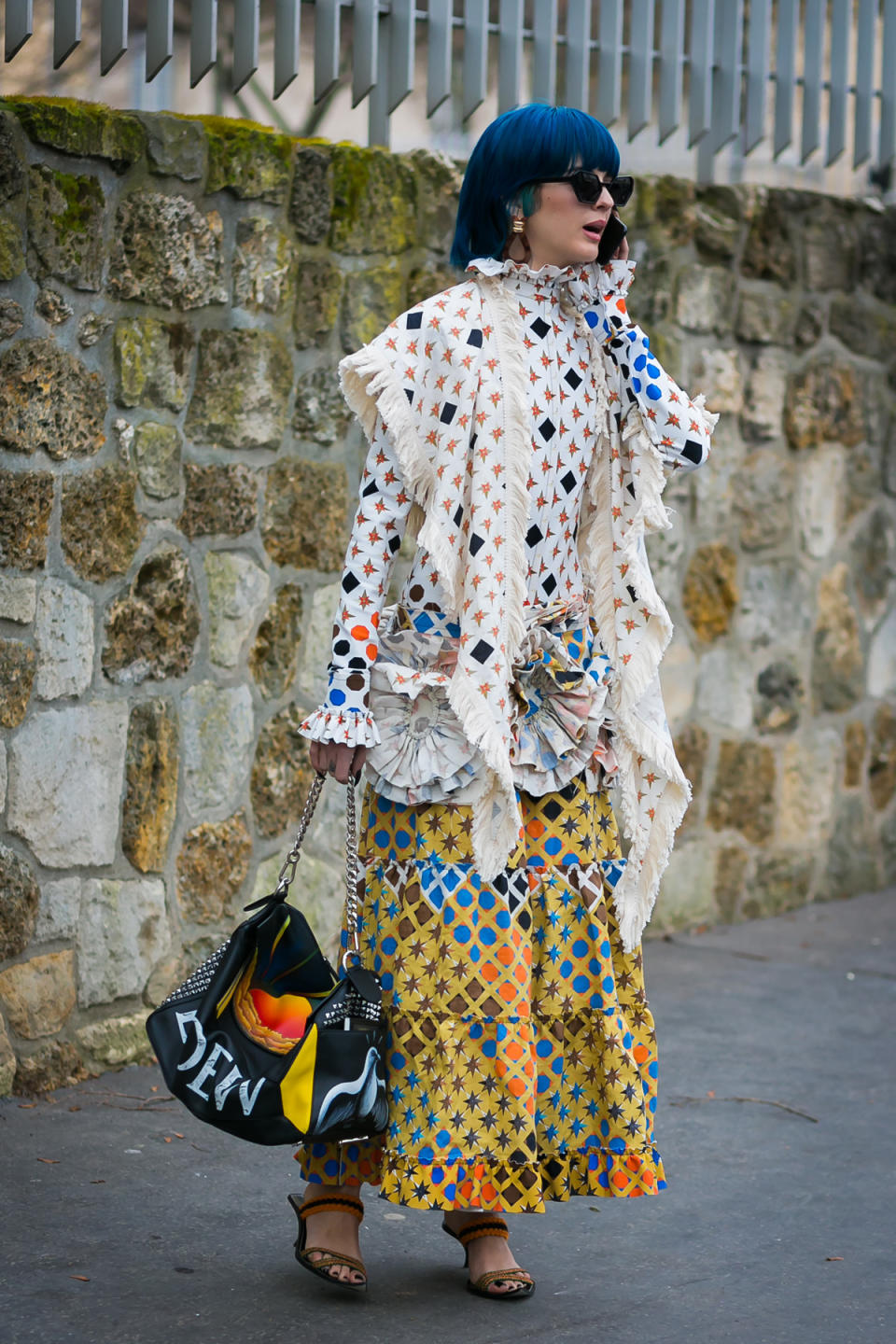 Sita Abellan makes a statement in almost-matching layers and a major Loewe bag.