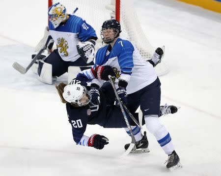 Ice Hockey - Pyeongchang 2018 Winter Olympics - Women's Semifinal Match - U.S. v Finland - Gangneung Hockey Centre, Gangneung, South Korea - February 19, 2018 - Hannah Brandt of U.S. and Mira Jalosuo of Finland (R) in action. REUTERS/Brian Snyder
