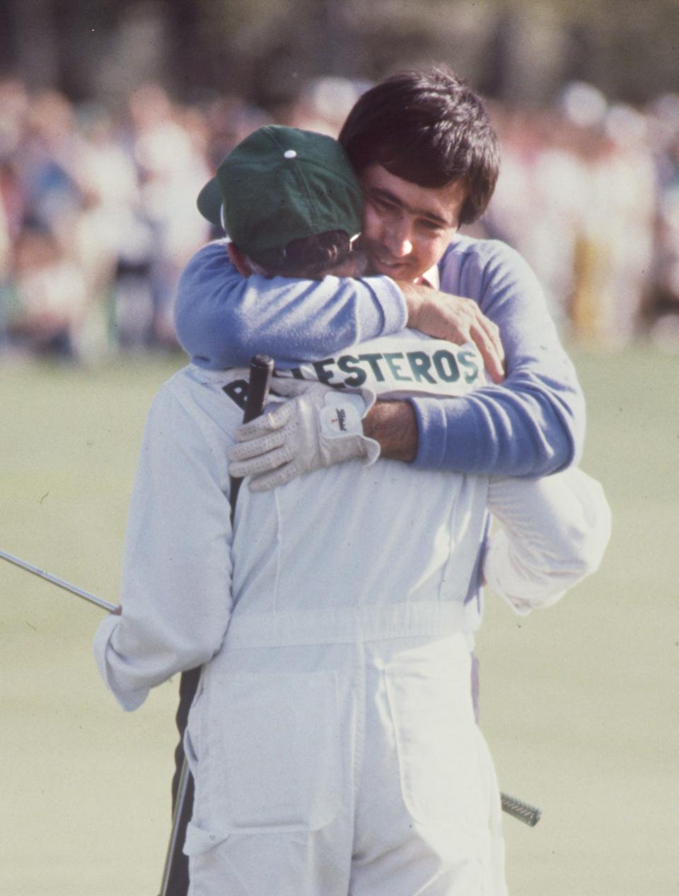 Seve Ballesteros hugs his caddie on No. 18 after winning the 1983 Masters.