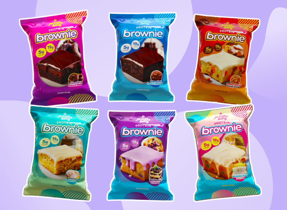 six packages of brownies on a purple background