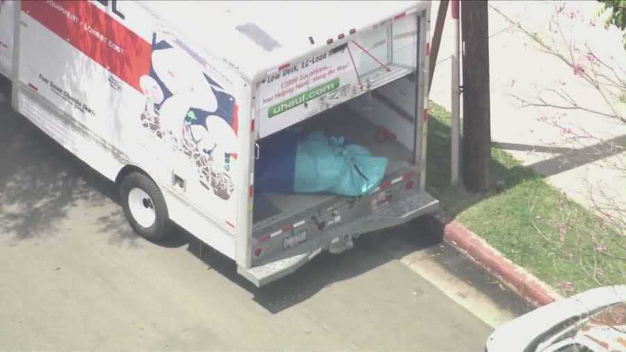 A body was found wrapped in a tarp in the back of a stolen U-Haul truck on April 18, 2024. (KTLA)