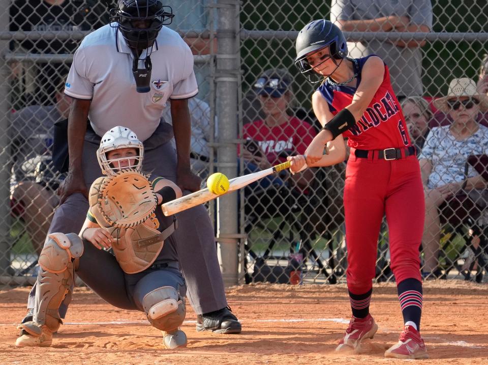 Taylor's Caydence Hassell connects during a game with DeLand at DeLand High School, Tuesday, April 2, 2024.