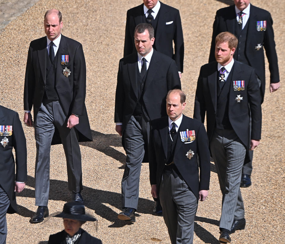 Prince William, Duke of Cambridge, Peter Phillips and Prince Harry, Duke of Sussex follow Prince Philip, Duke of Edinburgh's coffin in April 2021. (Getty)