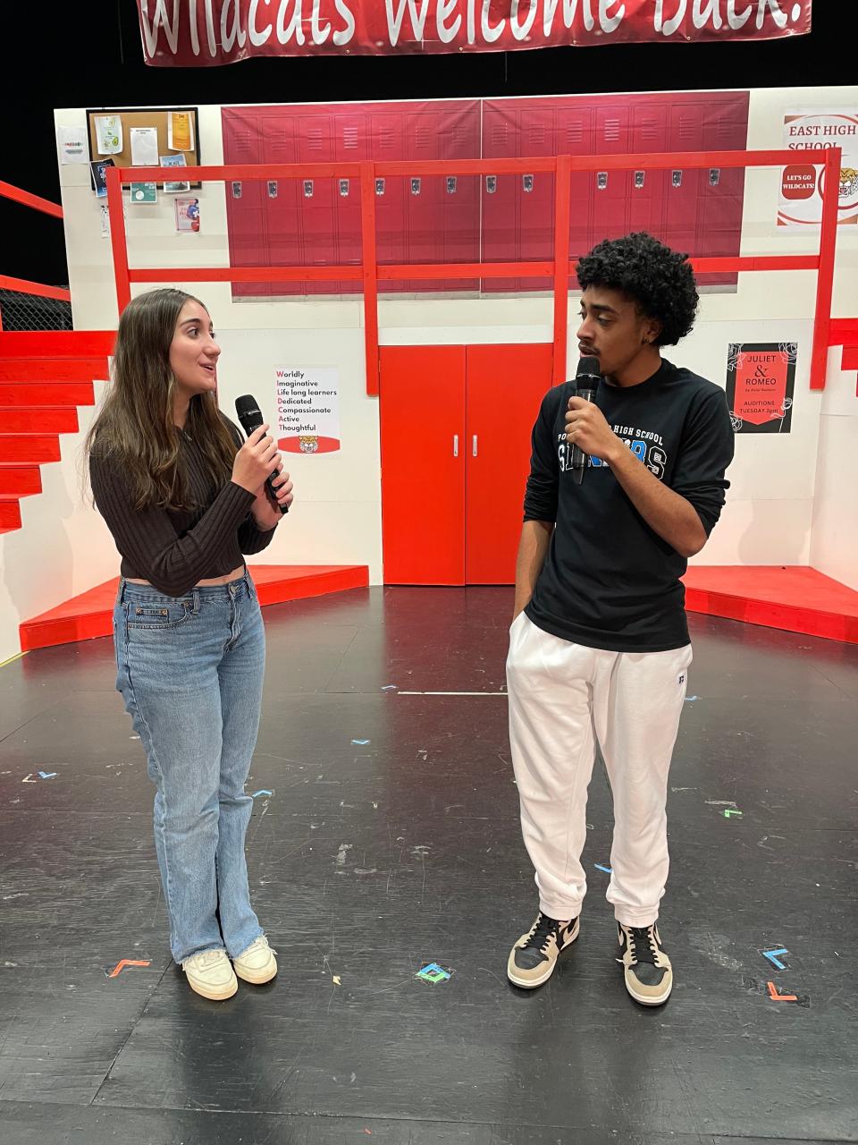 Gabriella Montez (Gwen Dominguez) and Troy Bolton (Demetrius Haddock) meet at a New Year's Eve Karaoke event in Port Chester High School's production of "High School Musical."