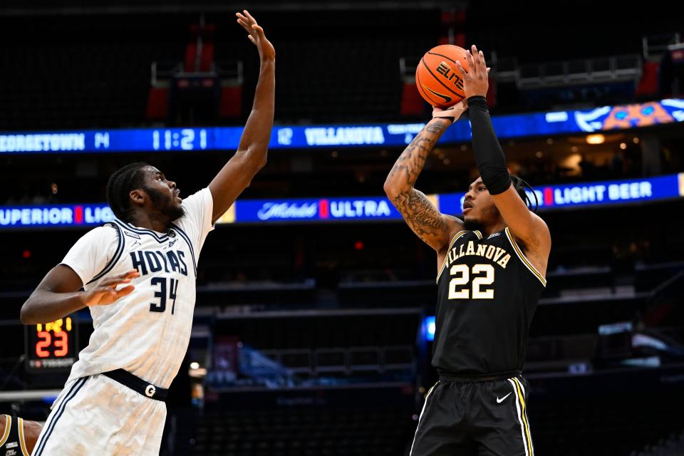 Villanova forward Cam Whitmore shoots over Georgetown center Qudus Wahab at Capital One Arena, Jan. 4, 2023 in Washington, DC.