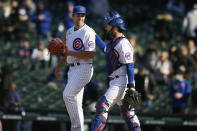 Chicago Cubs closing pitcher Jason Adam left, celebrates with catcher Austin Romine right, after defeating the Atlanta Braves in a Major League baseball game Saturday, April 17, 2021, in Chicago. (AP Photo/Paul Beaty)