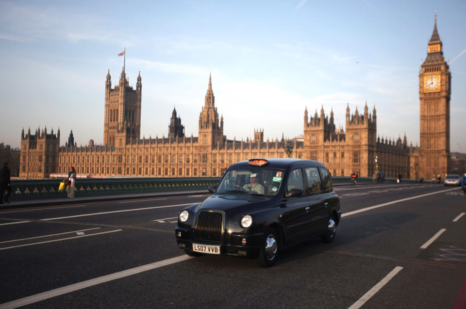 LONDON, ENGLAND - MARCH 28:  A black taxi cab makes its way over Westminster Bridge on March 28, 2012 in London, England.  (Photo by Dan Kitwood/Getty Images)