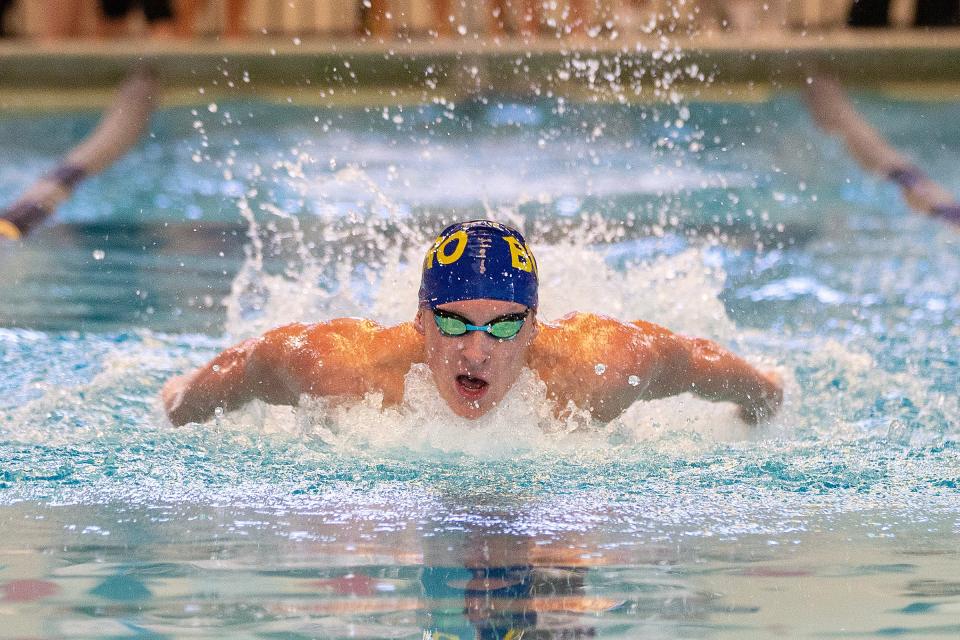 Freehold Boro's Dan Listor swims the 100 butterfly during the Freehold Borough vs. Freehold Township high school swim meet at Freehold Family YMCA in Freehold, NJ Tuesday, December 12, 2023.