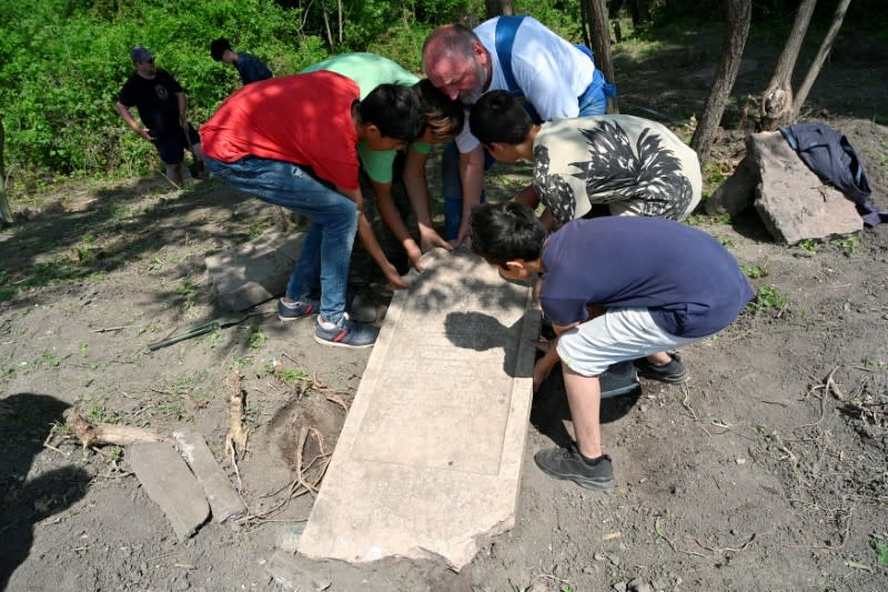 Slovak Roma teens help to restore forgotten Jewish cemetery, in Vinodol