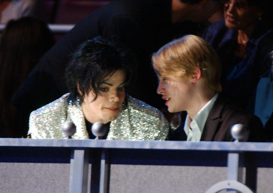 Michael Jackson and Macaulay Culkin at the Madison Square Garden in New York City, New York (Credit: Kevin Kane/WireImage)