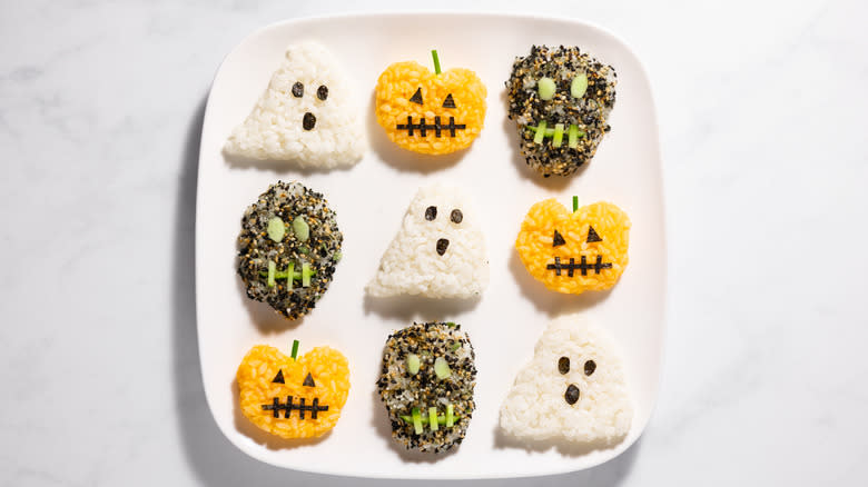 trio of halloween onigiri on plate 
