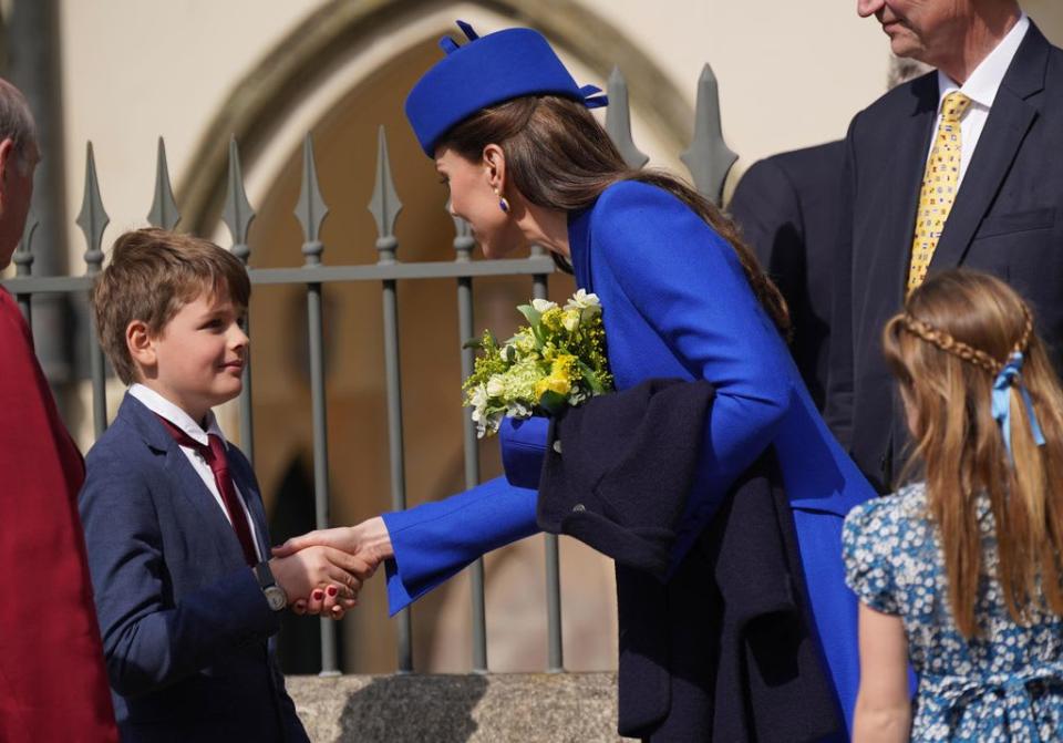 The Princess of Wales receiving a posy