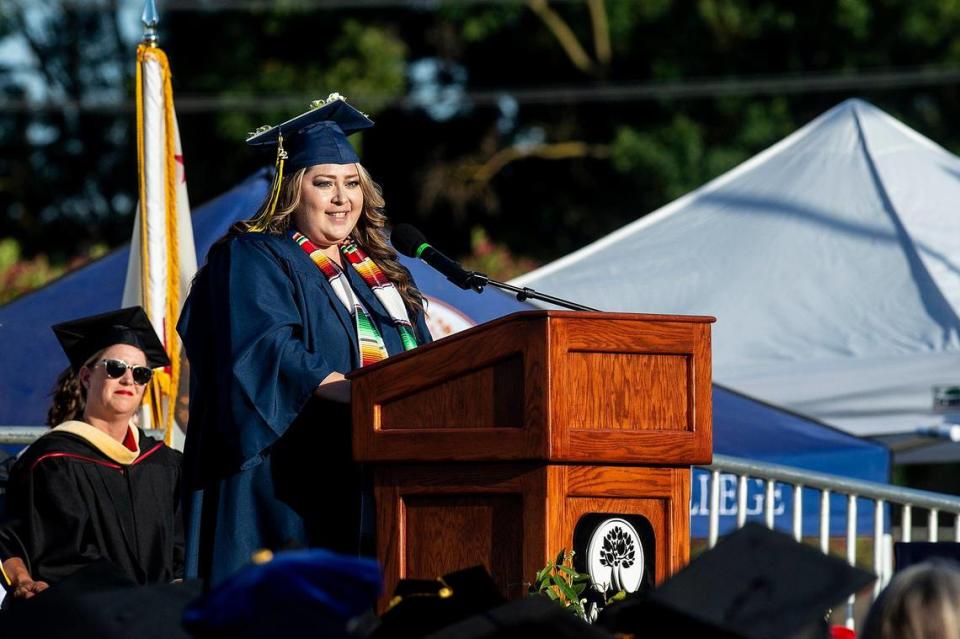 Graduate Gloria Lizeth Torres addresses fellow graduates during a commencement ceremony for the Merced College class of 2022 on the Don Odishoo Field at Stadium ’76 in Merced, Calif., on Friday, May 20, 2022.