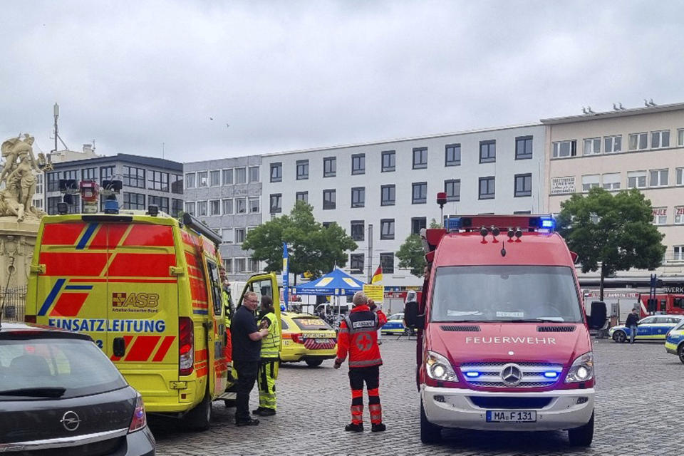 Police and firefighters are deployed following an incident on Mannheim's market square, Germany, Friday, May 31, 2024. An assailant with a knife attacked and wounded several people in a square in the southwestern German city of Mannheim on Friday, police said. Police shot at the attacker, who also was hurt. (Rene Priebe/dpa via AP)