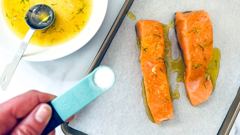 marinated salmon fillets on sheet pan