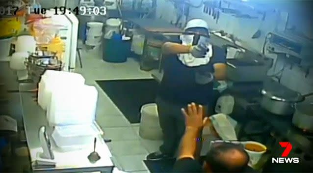 The robbery was caught on CCTV footage inside the restaurant. Photo: 7 News