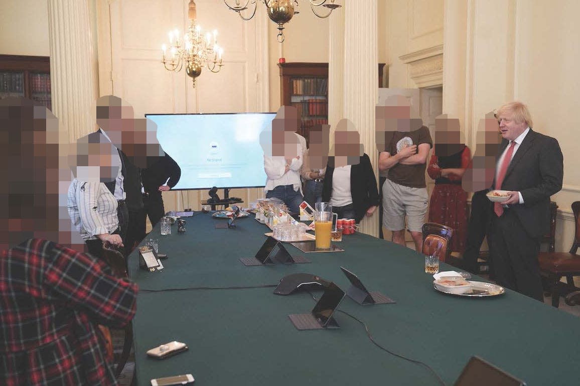 Then-PM Boris Johnson attends a gathering celebrating his birthday – in which cake and alcohol was provided – in the Cabinet Room at 10 Downing Street during the pandemic (Cabinet Office/PA) (PA Media)