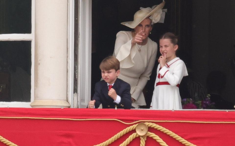 Prince George, Princess Charlotte and Sophie Duchess of Edinburgh watch trooping of the colour from a balcony on Horse Guards Parade in Westminster - George Cracknell Wright