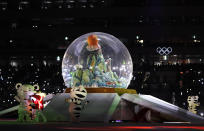 <p>Olympic mascots stand by a snow globe during the closing ceremony of the 2018 Winter Olympics in Pyeongchang, South Korea, Sunday, Feb. 25, 2018. (AP Photo/Kirsty Wigglesworth) </p>