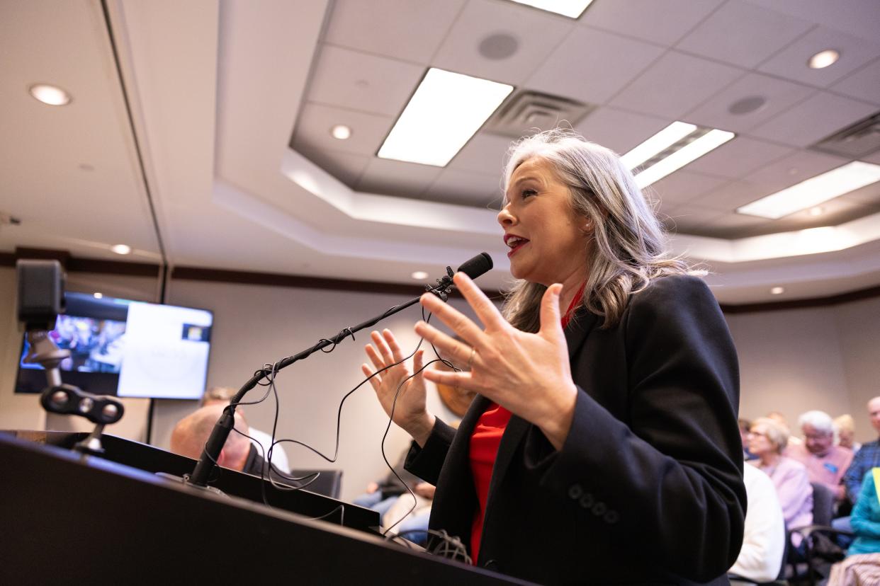 Rebekah Curran, District 7 Commissioner, gives a prayer during public comment Tuesday, April 23, 2024.