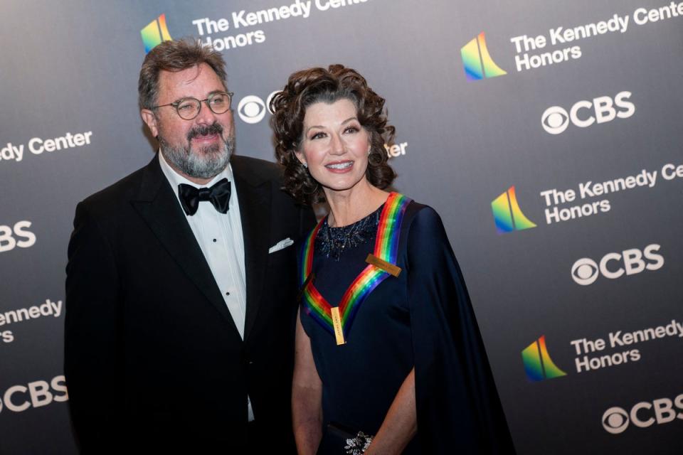 Grant and husband Vince Gill (AFP via Getty Images)