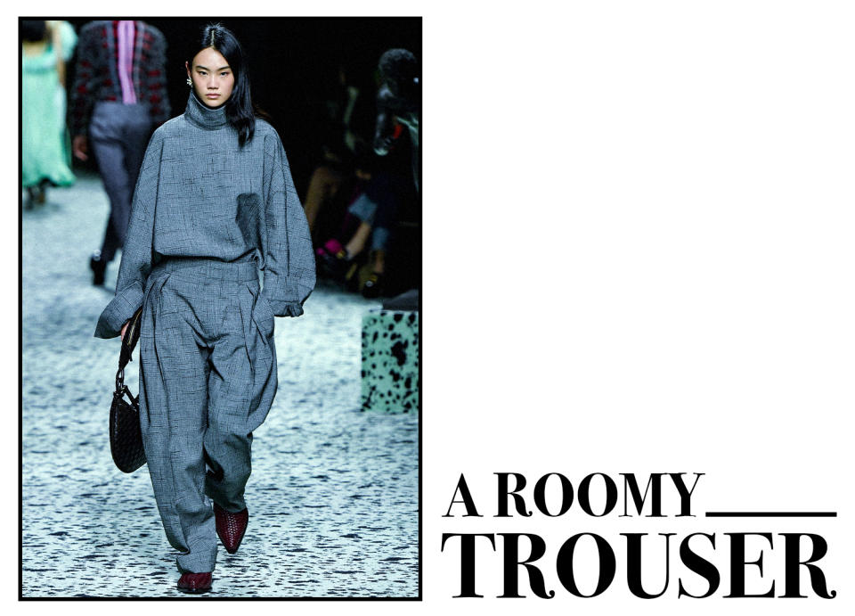 A graphic of a quiet luxury look by Bottega Veneta of gray trousers and a gray blouse