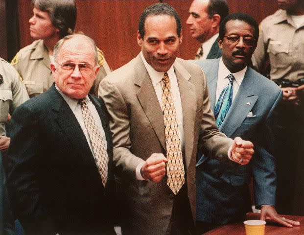 Agence France Presse/Getty O.J. Simpson (center) with his attorneys in 1995