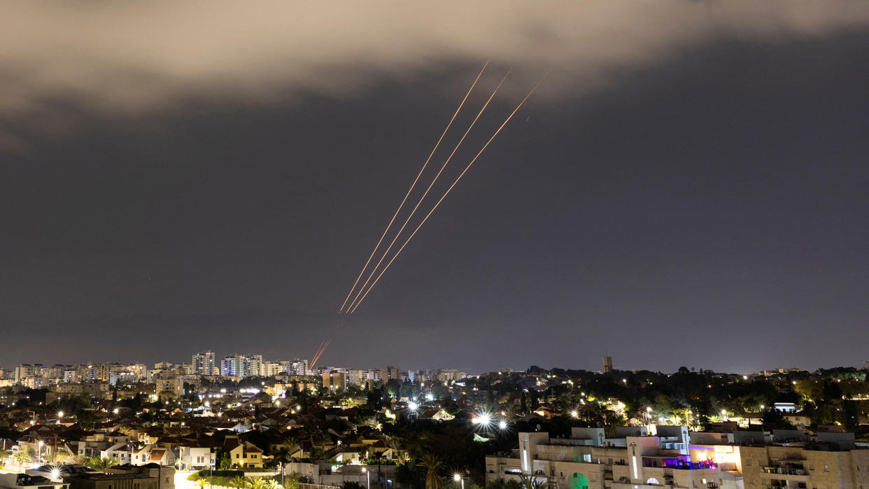  An anti-missile system operates after Iran launched drones and missiles towards Israel, as seen from Ashkelon, Israel. 