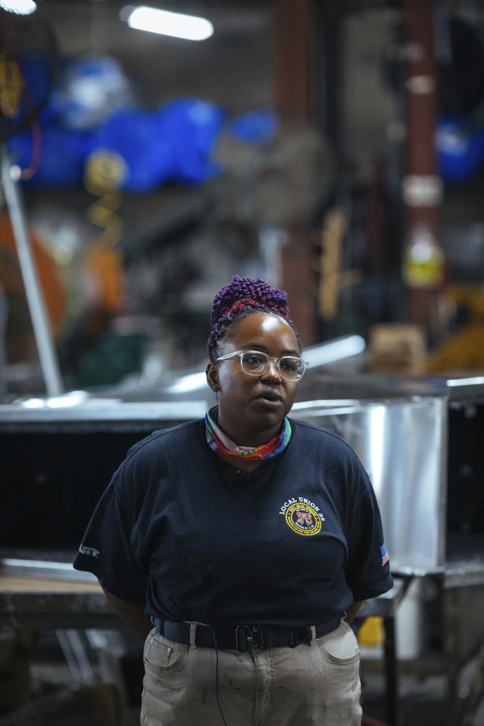 Sheet metal worker Carey Mercer at Contractors Sheet Metal on Tuesday, Aug. 3, 2021, in New York. The construction industry is fighting to recruit more women into a sector that faces chronic labor shortages. Women make up only 4% of skilled construction laborers in the U.S. and often face discrimination on jobs sites. (AP Photo/Kevin Hagen)