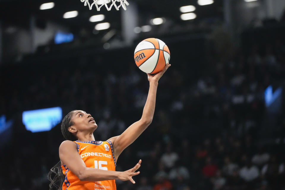 Connecticut Sun guard Tiffany Hayes goes to the basket during the first half of Game 2 of the team's WNBA basketball playoffs semifinal against the New York Liberty, Tuesday, Sept. 26, 2023, in New York. (AP Photo/Mary Altaffer)