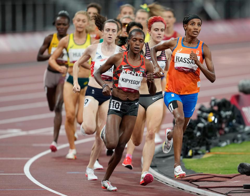 Aug 6, 2021; Tokyo, Japan; Faith Kipyegon (KEN) competes in the women's 1500m final during the Tokyo 2020 Summer Olympic Games at Olympic Stadium. Mandatory Credit: Andrew Nelles-USA TODAY Sports