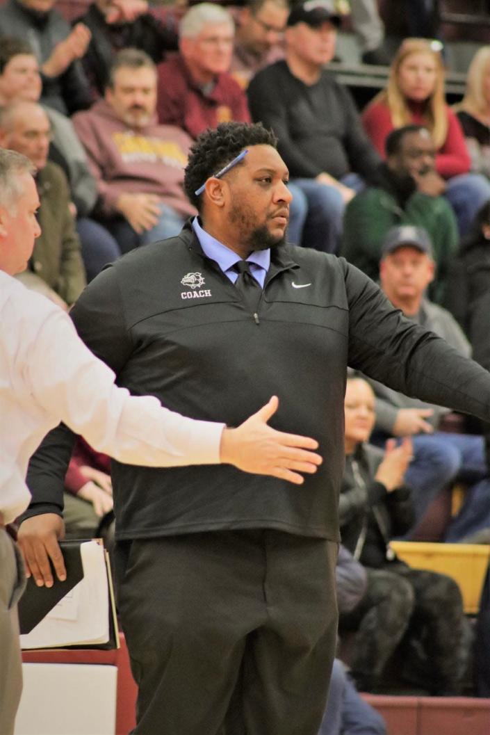 New Roosevelt coach Curtis Black paces the sideline as an assistant for Stow-Munroe Falls.