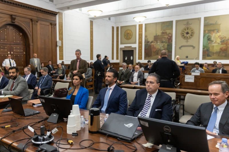 Donald Trump Jr. prepares in the courtroom for day two of testimony in the fifth week of the civil fraud trial against his father and former President Donald Trump on Thursday in New York City. Pool Photo by Jeenah Moon/UPI