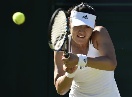 Ying-Ying Duan of China hits the ball during her match against Eugenie Bouchard of Canada at the Wimbledon Tennis Championships in London, June 30, 2015. REUTERS/Toby Melville