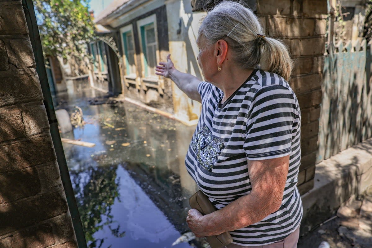 Anna, 73, says there is nothing left of homes in the heavily shelled city of Kherson, even after the waters recede (Bel Trew)