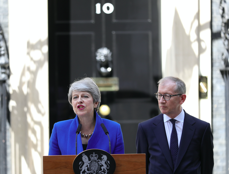 Theresa May congratulated Mr Johnson during her farewell speech outside Number 10 (PA)