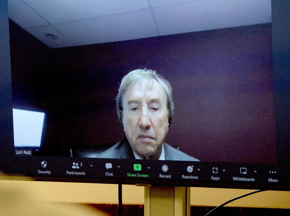 Edward Unsell, lawyer for defendant Peter J. Cadigan, attends in video a preliminary hearing for his client  Jan. 19, 2023 in Sangamon County Circuit Court.