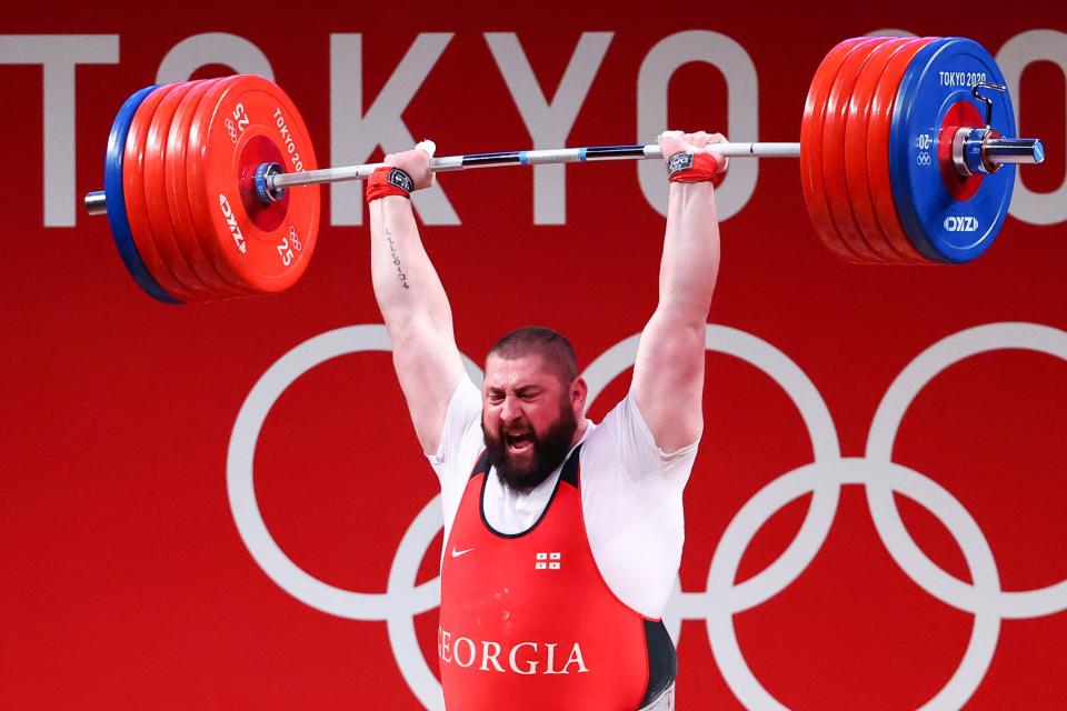 Tokyo 2020 Olympics - Weightlifting - Men's +109kg - Group A - Tokyo International Forum, Tokyo, Japan - August 4, 2021. Lasha Talakhadze of Georgia in action. REUTERS/Edgard Garrido