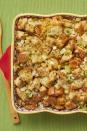 <p>Simple and classic, this cornbread dressing is one of Ree's favorite things to serve on Turkey Day. "It isn’t soggy at all; even after baking, it remains light and crumbly and beautifully textural," she notes. "A real feast for the senses!"</p><p><strong><a href="https://www.thepioneerwoman.com/food-cooking/recipes/a11893/thanksgiving-dressing-recipe/" rel="nofollow noopener" target="_blank" data-ylk="slk:Get the recipe.;elm:context_link;itc:0;sec:content-canvas" class="link ">Get the recipe.</a></strong></p>