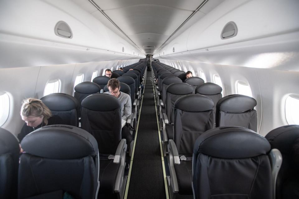 An almost empty British Airways passenger plane flies from Milan to London on March 5, 2020 in Milan, Italy. (Photo by Laurel Chor/Getty Images)